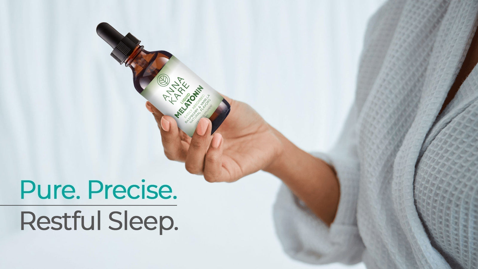Woman holding AnnaKare Liquid Melatonin in a calm bathroom setting – pure, precise, restful sleep supplement